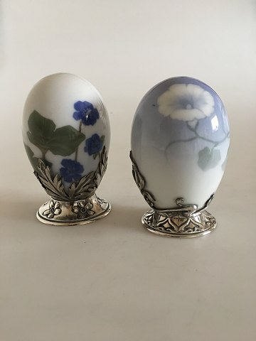 Pair of Royal Copenhagen Art Nouveau Eggs with A. Michelsen Stirling Silver 
Mounted Pieces.