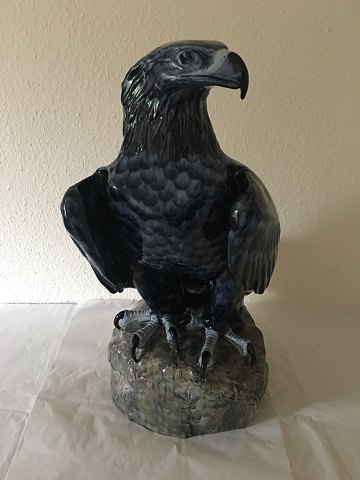 Royal Copenhagen Blue Eagle Vilhelm Th. Fischer 1857-1928. Figure, porcelain, 
eagle seated on rock.