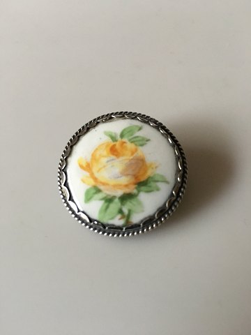 Royal Copenhagen Porcelain Button in Silver Mounting with Yellow Rose 
Decoration.
