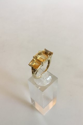 Gold Ring with three yellow stones. 14 K