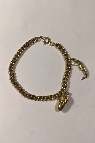 Goldbracelet 18 kt with charms