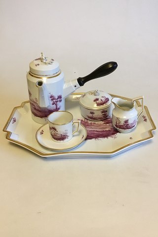 Royal Copenhagen Tete á Tete Coffee Set with Dark Rose decoration in overglaze. 
Consists of: Tray, Coffee Pot, Creamer, Sugar Bowl and a Coffee Cup