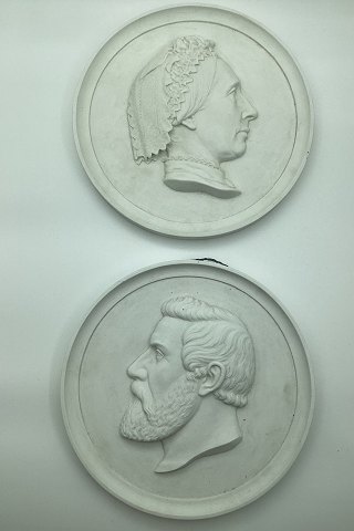 Pair of Royal Copenhagen portrait plates in bisquit by Niels Georg Henriksen