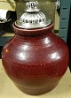 Royal Copenhagen Stoneware Vase in oxblood with silverplated bronze lid by Knud 
Andersen