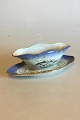 Royal Copenhagen Blue Fish Plate with Fish Relief Border. Same painters as the 
ones painting Flora Danica. Measures 24,5cm and is in good condition. Marked 
12/1212/3003