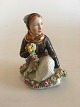 Royal Copenhagen Overglaze figurine of Amager Flower Girl No 12412