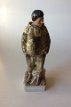 Royal Copenhagen Overglaze figurine of Greenland man No 12225