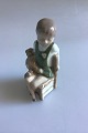 Royal Copenhagen Figurine, Girl with teddybear No 5195