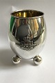 A Dragsted Silver Beaker Eggshaped on 3 ball feet,
