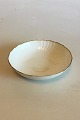 Royal Copenhagen White Curved with serrated Gold edge(Pattern 387/ Josephine) 
Round Bowl No 1518