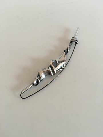N.E. From Hatpin or Brooch in Sterling Silver