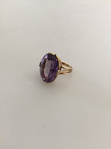 14K Gold Ring Marked JF Ornamented with Amathyst Stone