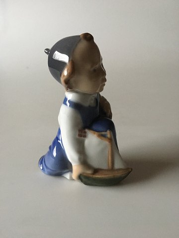 Royal Copenhagen Figurine of Boy with ship "Aage" No 3272