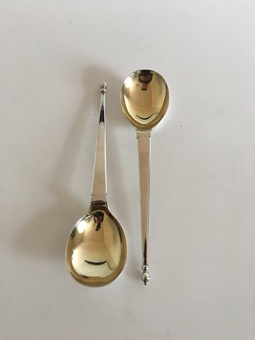 Set of two serving spoons in English Silver, partly gilded.