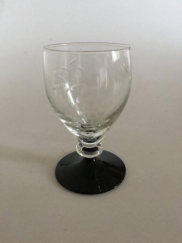 "Jane" Blackfooted White Wine Glass from Holmegaard with ingraved grapes.