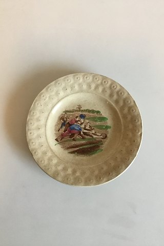 Old English Staffordshire Plate with motif of men / Boys playing rugby