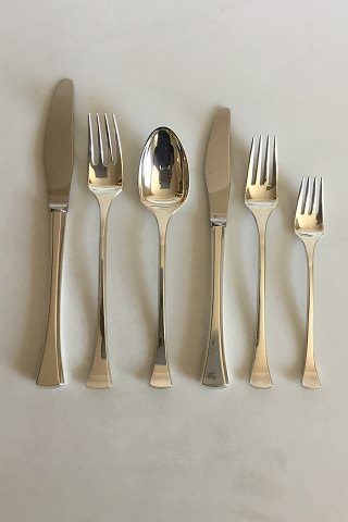 Hans Hansen Sterling Silver  Kristine Flatware Set for 8 persons, 48 pieces.
The Set consists of:
8 x Dinner Knifes
8 x Dinner Forks
8 x Dinner Spoons
8 x Lunch Knifes
8 x Lunch Forks
8 x Cake Forks