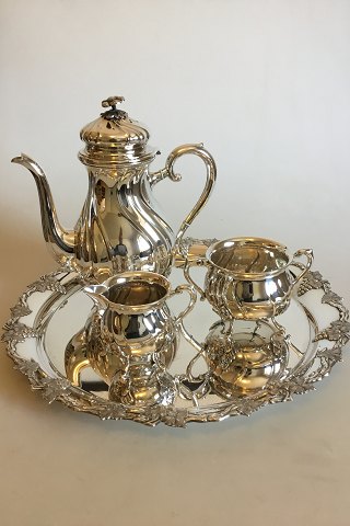 Coffee set in Silver Plater and round Art Nouveau packet in Nickel Silver with 
grape decoration. Coffee pot, Sugar Bowl and Creamer.