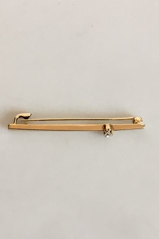 Brooch in 14K. Gold with Brilliant