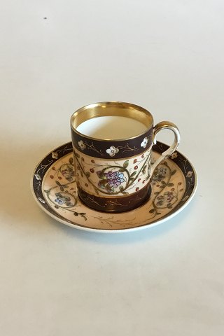 Carl Tielsch / Altwasser Dark brown Mocca cup decorated with flower frieze and 
gold. From 1875-1909