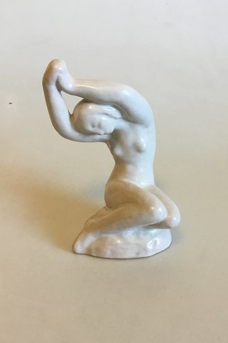 L. Hjorth White glazed ceramic Figurine of sitting woman No 573