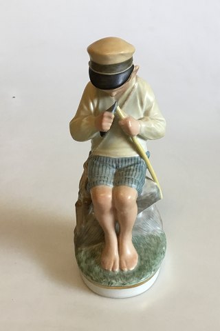 Royal Copenhagen Overglaze  Figurine Boy Cutting Stick No 905