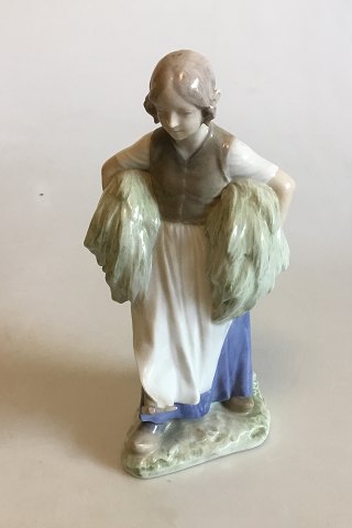 Royal Copenhagen Figurine of Girl with Hay and Rake No 903