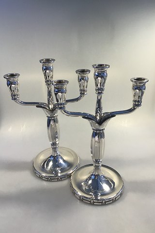 Georg Jensen Sterling Silver Pair of three light candelabra, No 161. 
(1925-1932).