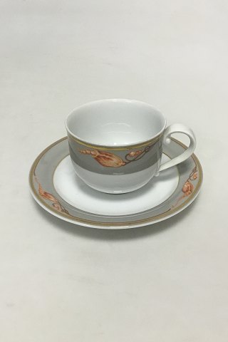 Royal Copenhagen Magnolia, Grey with red decoration Coffee Cup and Saucer 
072/073