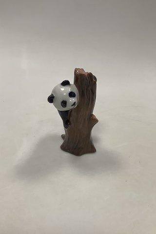 Royal Copenhagen Figurine Panda on tree stump No 664