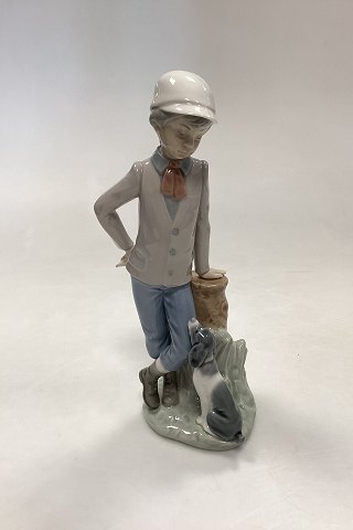 DAO/Lladro Porcelain figurine of Boy with Dog