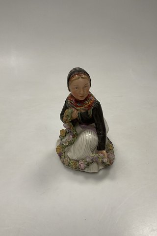 Royal Copenhagen Overglaze figurine of Amager Flower Girl No 12412