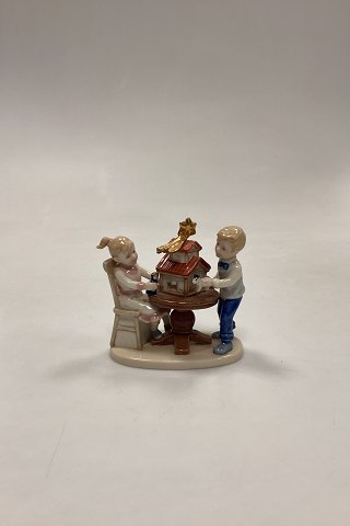 Royal Copenhagen Christmas Figurine - Boy and Girl with Nativity Scene No. 294