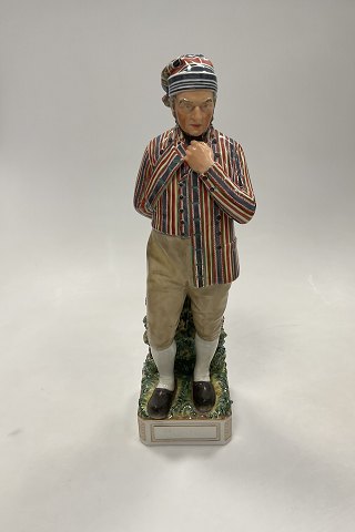 Royal Copenhagen Overglaze Figurine of Young man from Horne No. 12230