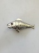 Sterling Silver Fake Vinaigrette by Fritz Sophus Albertus (1877-1950) shaped as 
a fish with red glas stones.