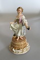 Meissen Girl on a Wine Barrel with Grapes Figurine