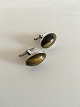 Oval Cufflinks in Silver ornamented with Tiger Eye Stones