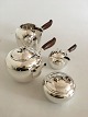 Georg Jensen Sterling Silver Tea Set No. 875. Teapot, Water Pitcher, Creamer, 
Sugar Bowl