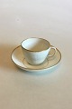Royal Copenhagen White Curved with serrated Gold edge(Pattern 387/ Josephine) 
Coffee Cup and Saucer No 1549