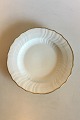 Royal Copenhagen White Curved with serrated Gold edge(Pattern 387/ Josephine) 
Dinner plate No 1621