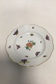 Herend Porcelain Hand-painted desert plate with insects, butterflies and flower.