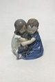 Royal Copenhagen Figurine of children with dachshund No 707/070, from 1992-1999