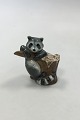 Roya lCopenhagen figurine of Raccoon on a wooden stump No 054
