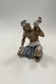 Dahl Jensen Figurine of Sudanese Sudanese man with cockatoo No. 1305