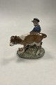 Royal Copenhagen Figurine Boy with Calf No 772 Brown