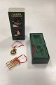Georg Jensen Golden Christmas Holiday Ornament - Snowman and Sledge 2004