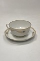 Royal Copenhagen No. 118/2007 Tea Cup with Saucer Golden Peacock Ornament